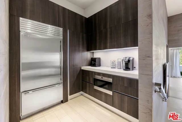 a view of a swimming pool with a yard