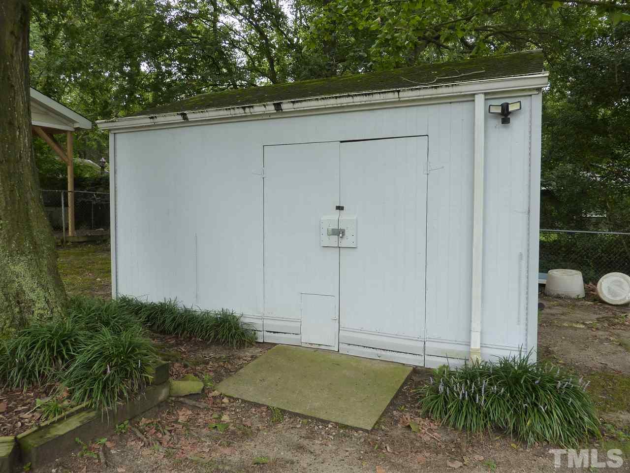 7201 Perry Creek Road Raleigh, NC 27616 - Photo 12 of 16 Garden shed is wired with electric for all your outdoor storage needs!