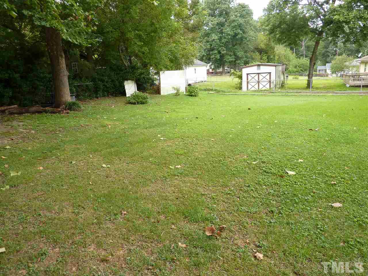 7201 Perry Creek Road Raleigh, NC 27616 - Photo 14 of 16 Spacious fenced backyard would be great to entertain guests, play, or let your pets run!