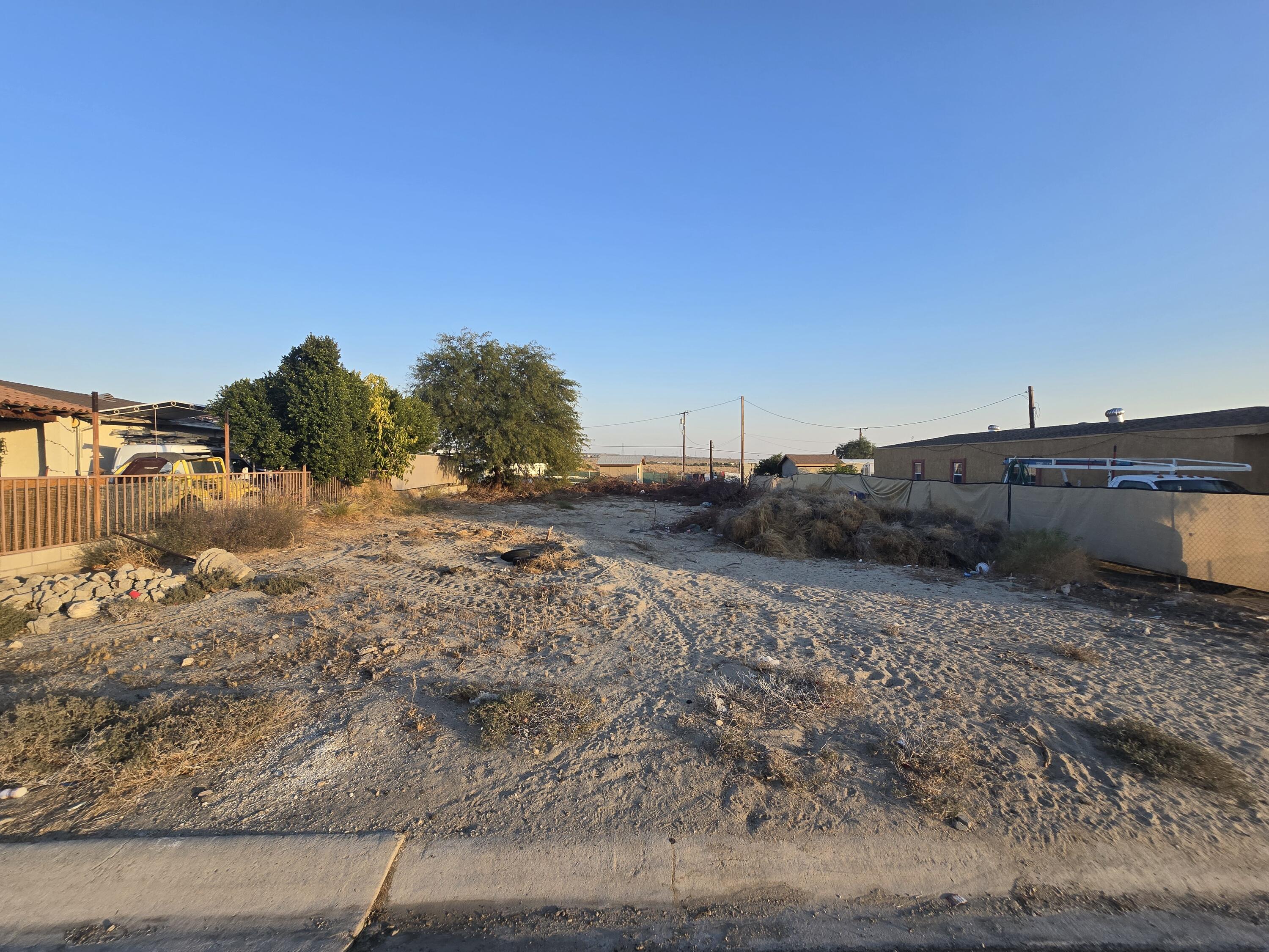 a view of a road with a building in the background