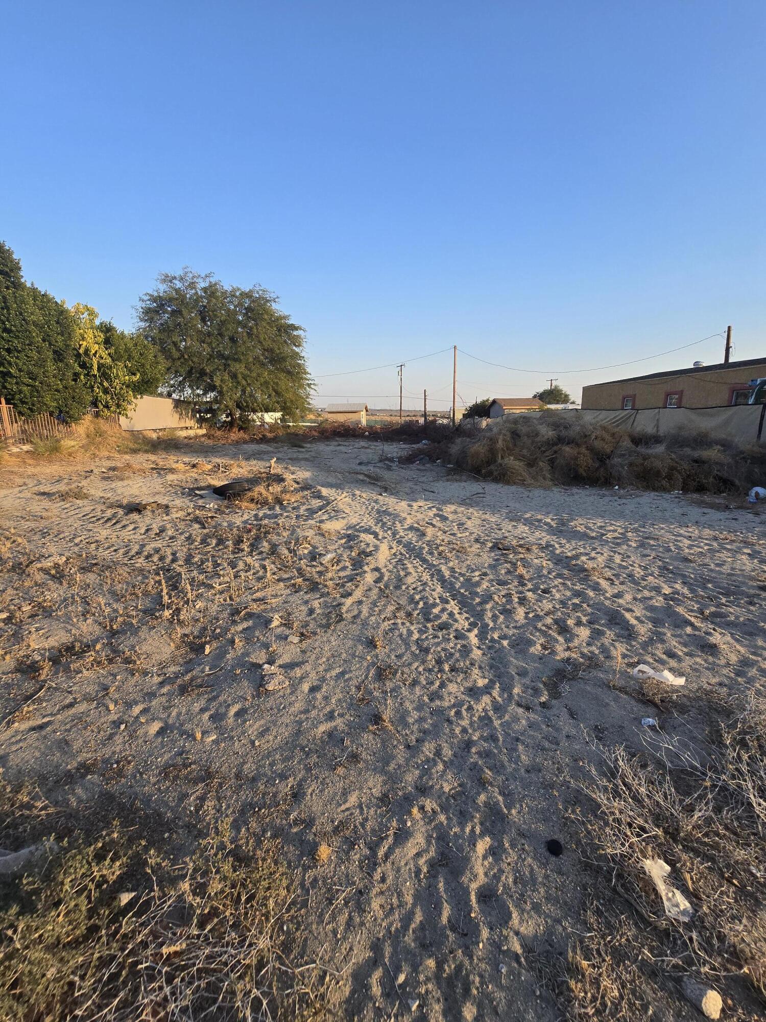 0 Beachcomber Way Mecca, CA 92254 - Photo 3 of 7 a view of a field with trees in background