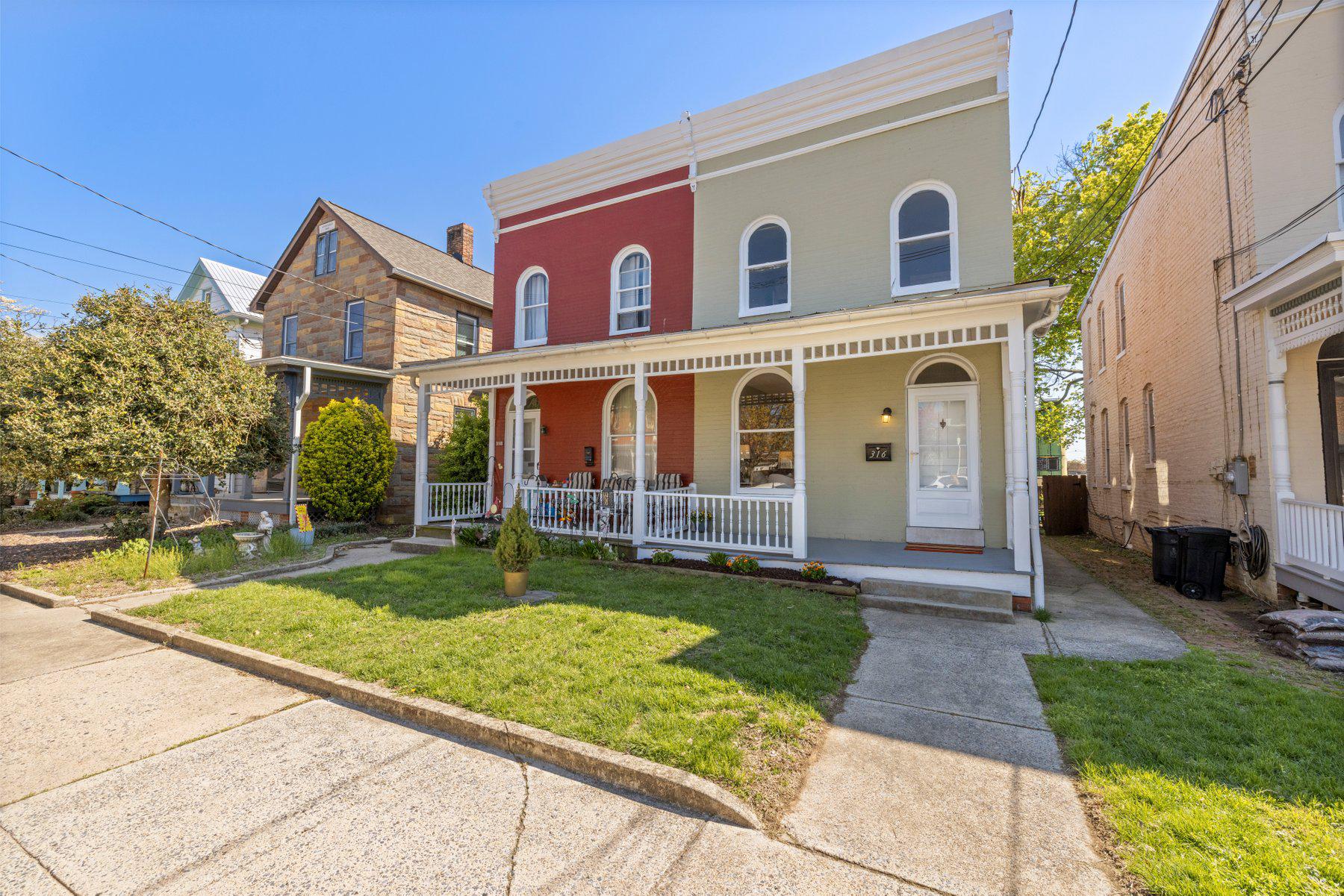 Welcome home! Charming front porch welcomes you in