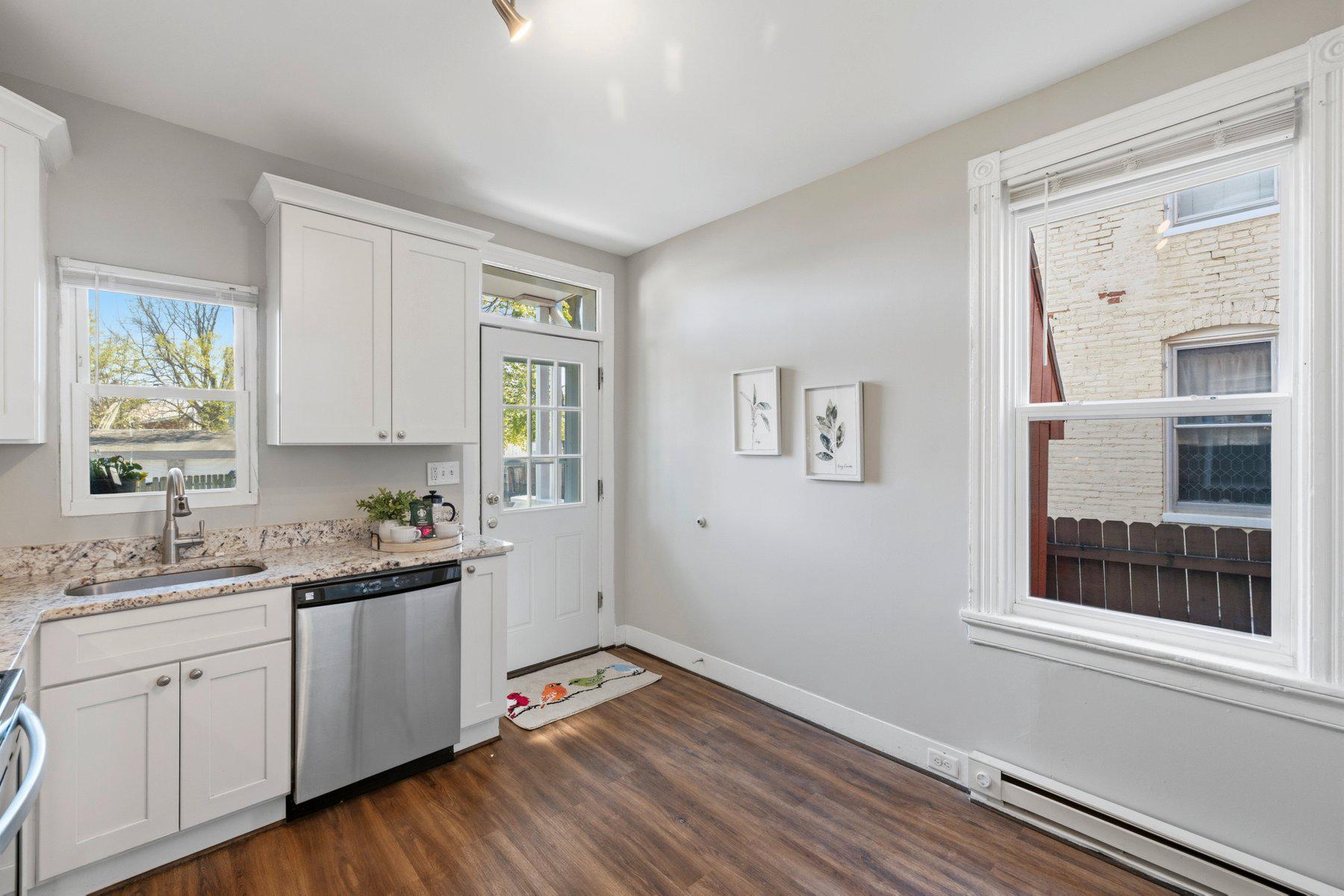 316 East 3rd Street Frederick, MD 21701 - Photo 13 of 41 Bright and airy kitchen with door to back porch.