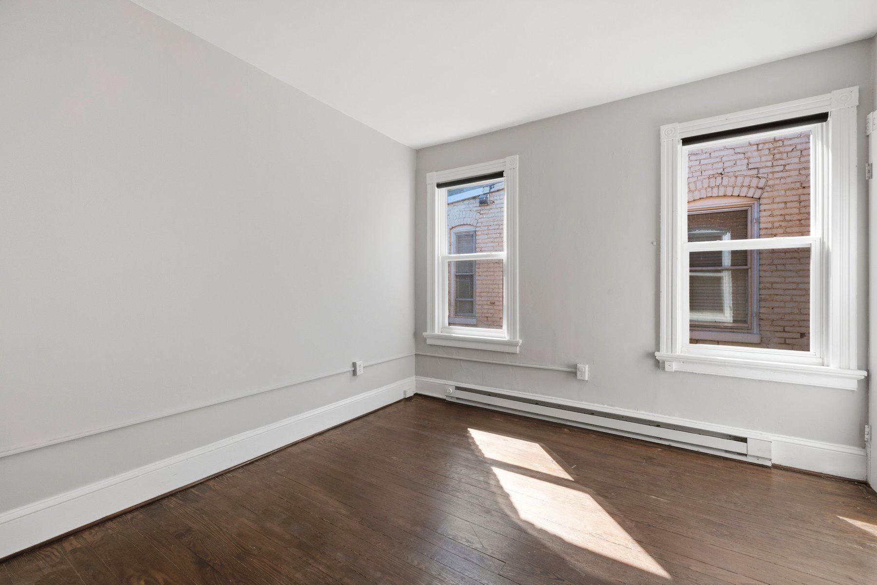 316 East 3rd Street Frederick, MD 21701 - Photo 20 of 41 Second bedroom. Freshly painted, hardwood floors.