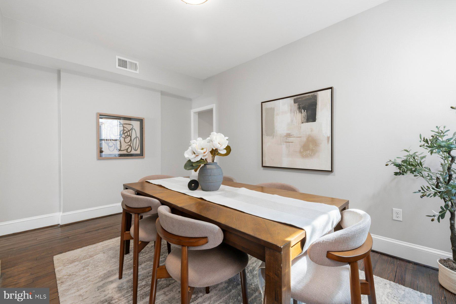 316 East 3rd Street Frederick, MD 21701 - Photo 10 of 41 Elegant dining space with modern flair.