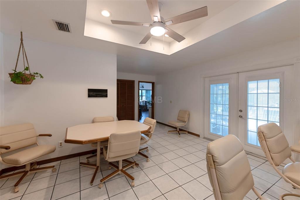 2298 West Pine Ridge Boulevard Beverly Hills, FL 34465 - Photo 11 of 34 a view of a dining room with furniture