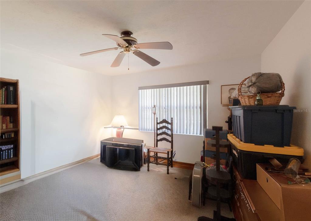 2298 West Pine Ridge Boulevard Beverly Hills, FL 34465 - Photo 18 of 34 a living room with furniture and a window