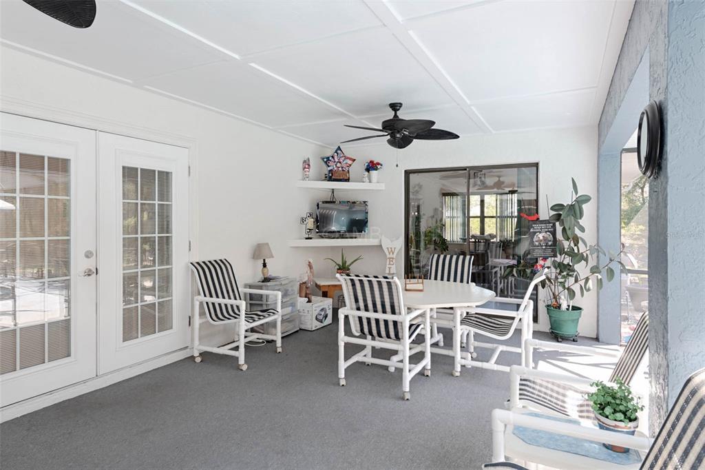 2298 West Pine Ridge Boulevard Beverly Hills, FL 34465 - Photo 28 of 34 a dining room with furniture and windows