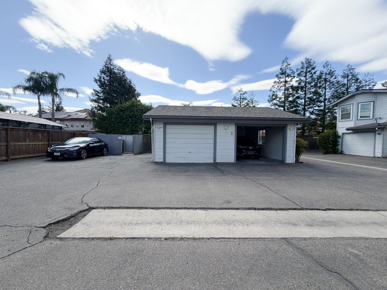 505 South Del Norte Avenue Kerman, CA 93630 - Photo 11 of 12 a view of a car parked in front of a house