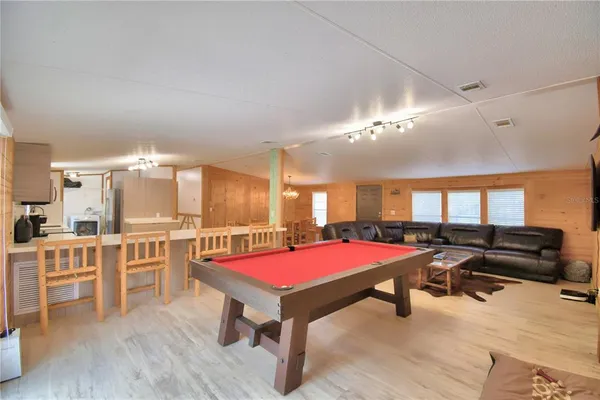 a view of living room kitchen