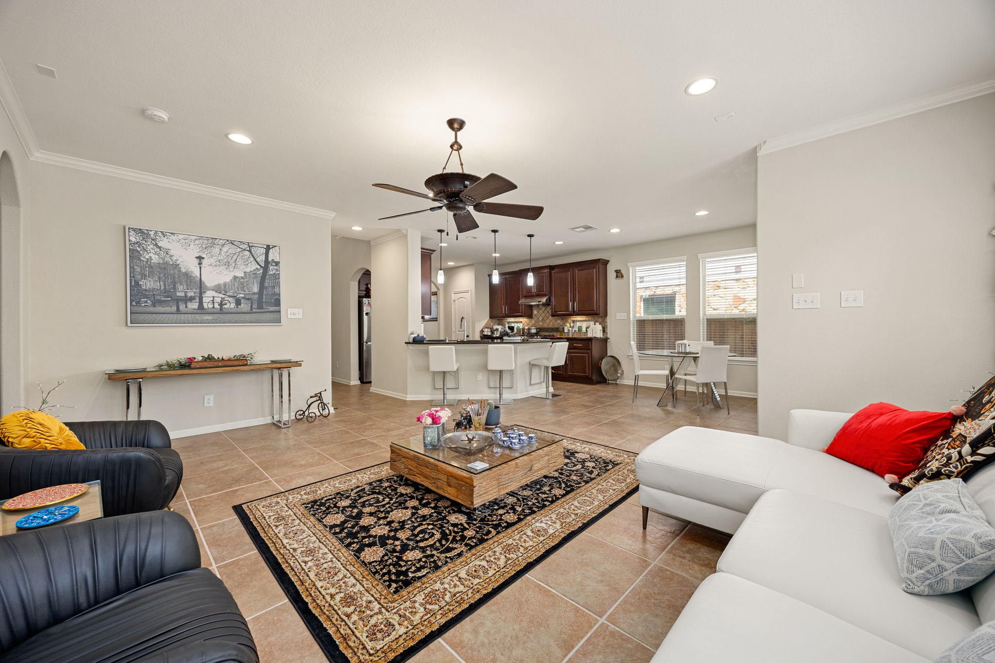 22 South Marshside Place Spring, TX 77389 - Photo 12 of 43 a living room with furniture and kitchen view