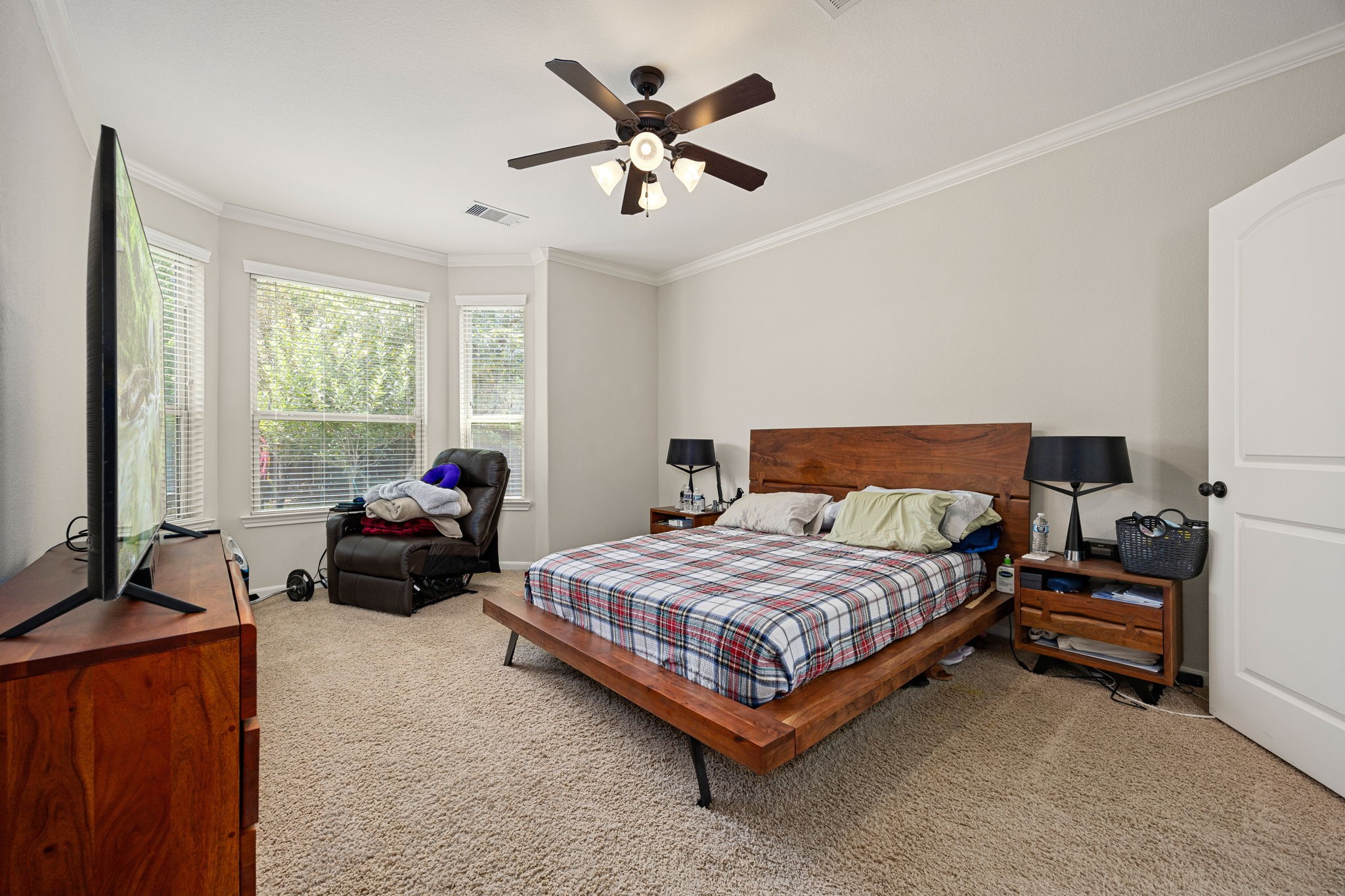 22 South Marshside Place Spring, TX 77389 - Photo 29 of 43 a bedroom with bed and a large window