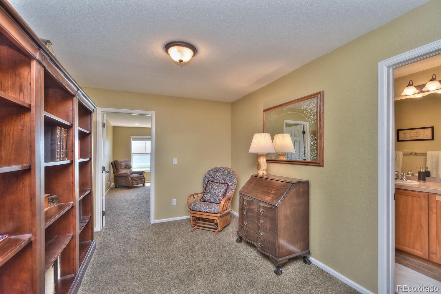 4464 Eagle River Run Broomfield, CO 80023 - Photo 18 of 32 a room with furniture and closet
