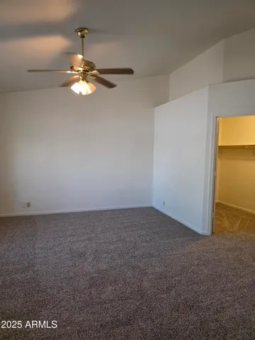 a view of an empty walk in closet
