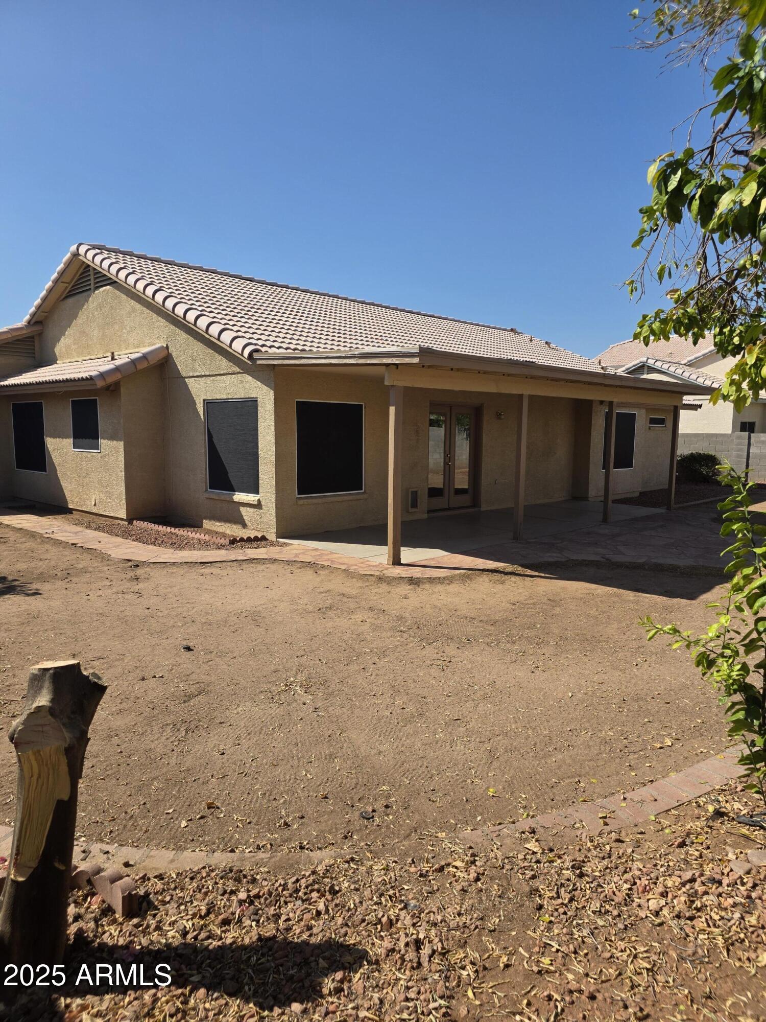 8758 West Bloomfield Road Peoria, AZ 85381 - Photo 18 of 20 a front view of a house with a yard