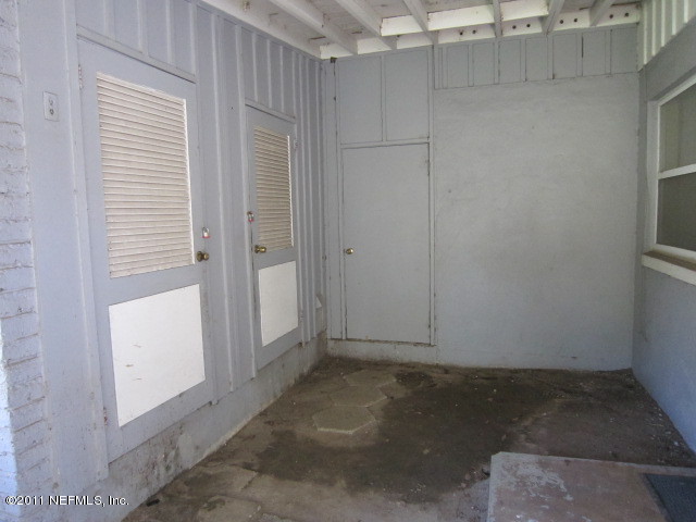 6958 Rollo Road Jacksonville, FL 32205 - Photo 5 of 8 a view of an empty room