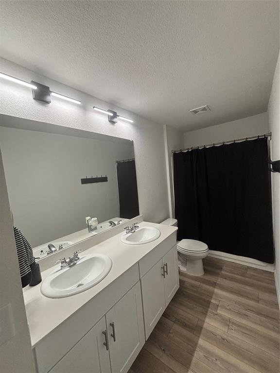 1129 Clear Dusk Lane Forney, TX 75126 - Photo 8 of 13 a bathroom with a sink and a mirror