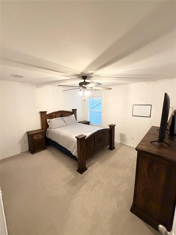 1129 Clear Dusk Lane Forney, TX 75126 - Photo 10 of 13 a bedroom with furniture and a couch