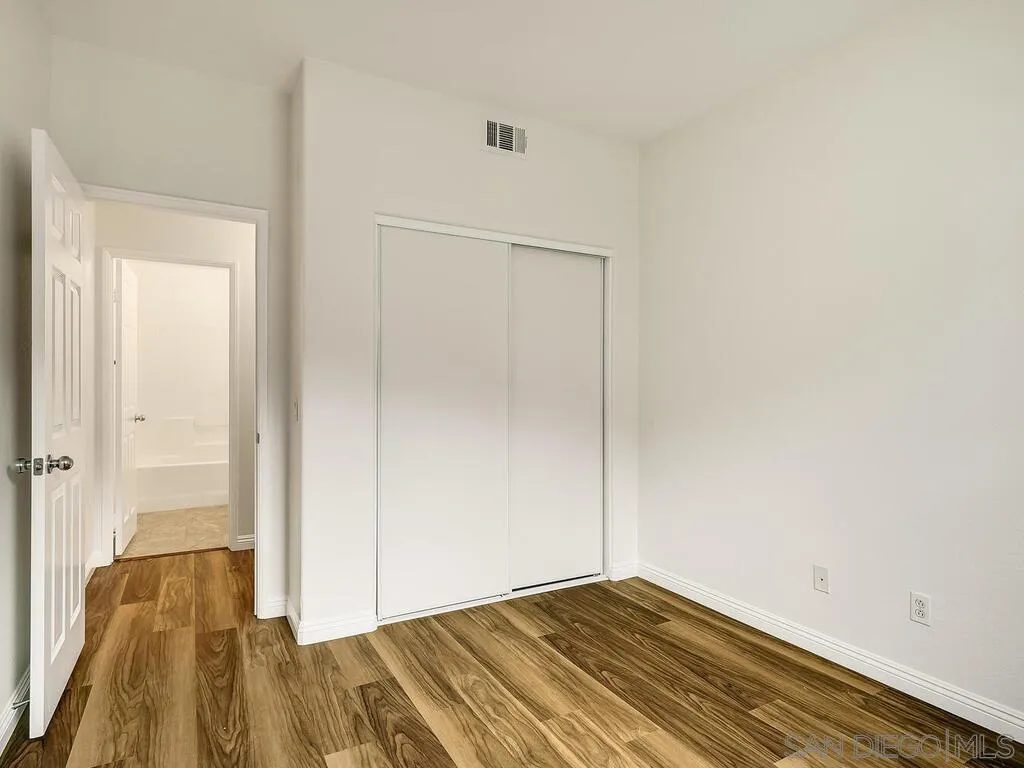 10214 Daybreak Lane, Unit 5 Santee, CA 92071 - Photo 15 of 38 a view of hallway with wooden floor