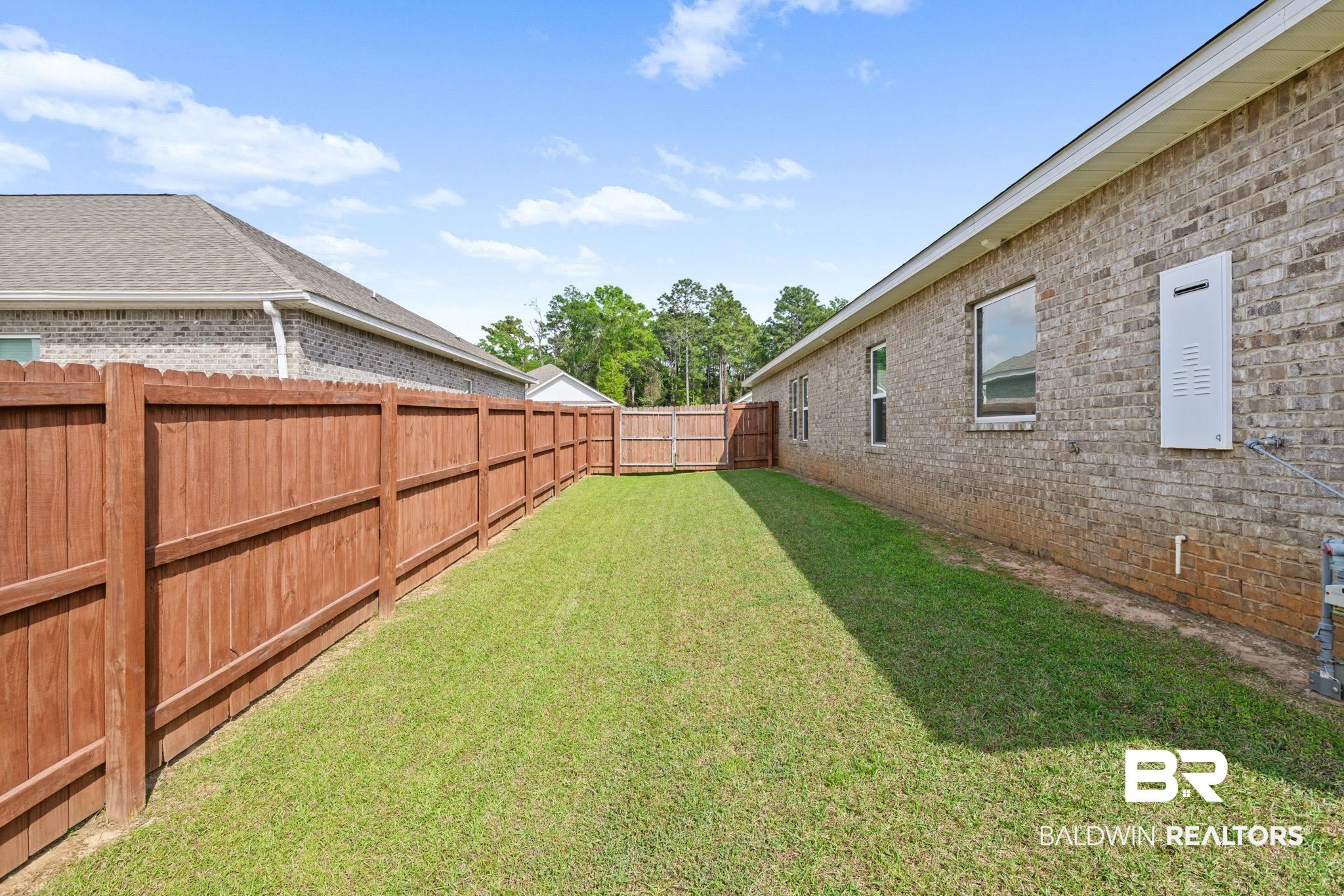 2183 Meadowview Loop Semmes, AL 36575 - Photo 13 of 58 View of fenced backyard