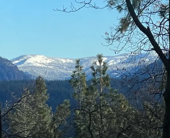 a view of lake and mountain