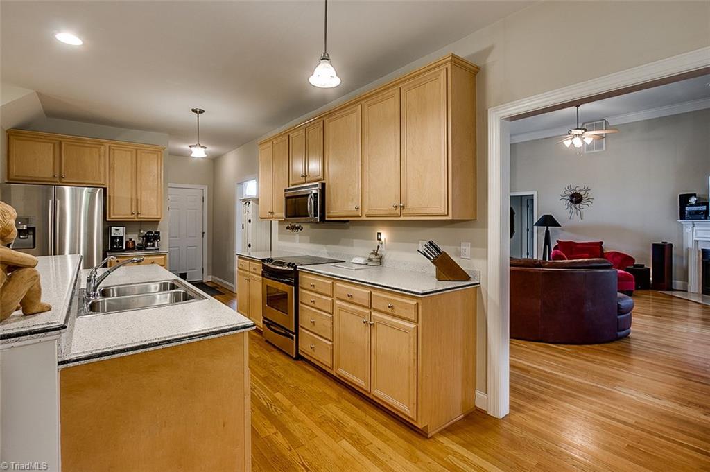 8509 Merriman Farm Road Oak Ridge, NC 27310 - Photo 10 of 30 Kitchen to Great Room