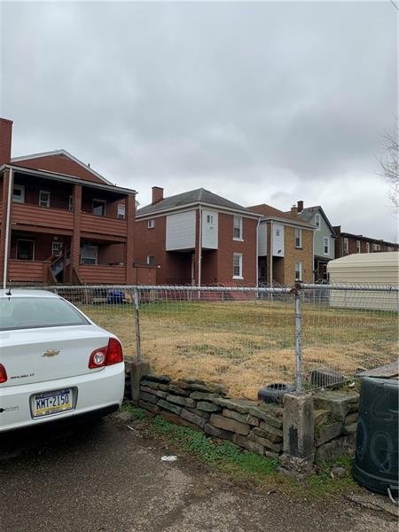 200 Jane Street McKees Rocks, PA 15136 - Photo 13 of 23 Fenced in yard back of units each with porches