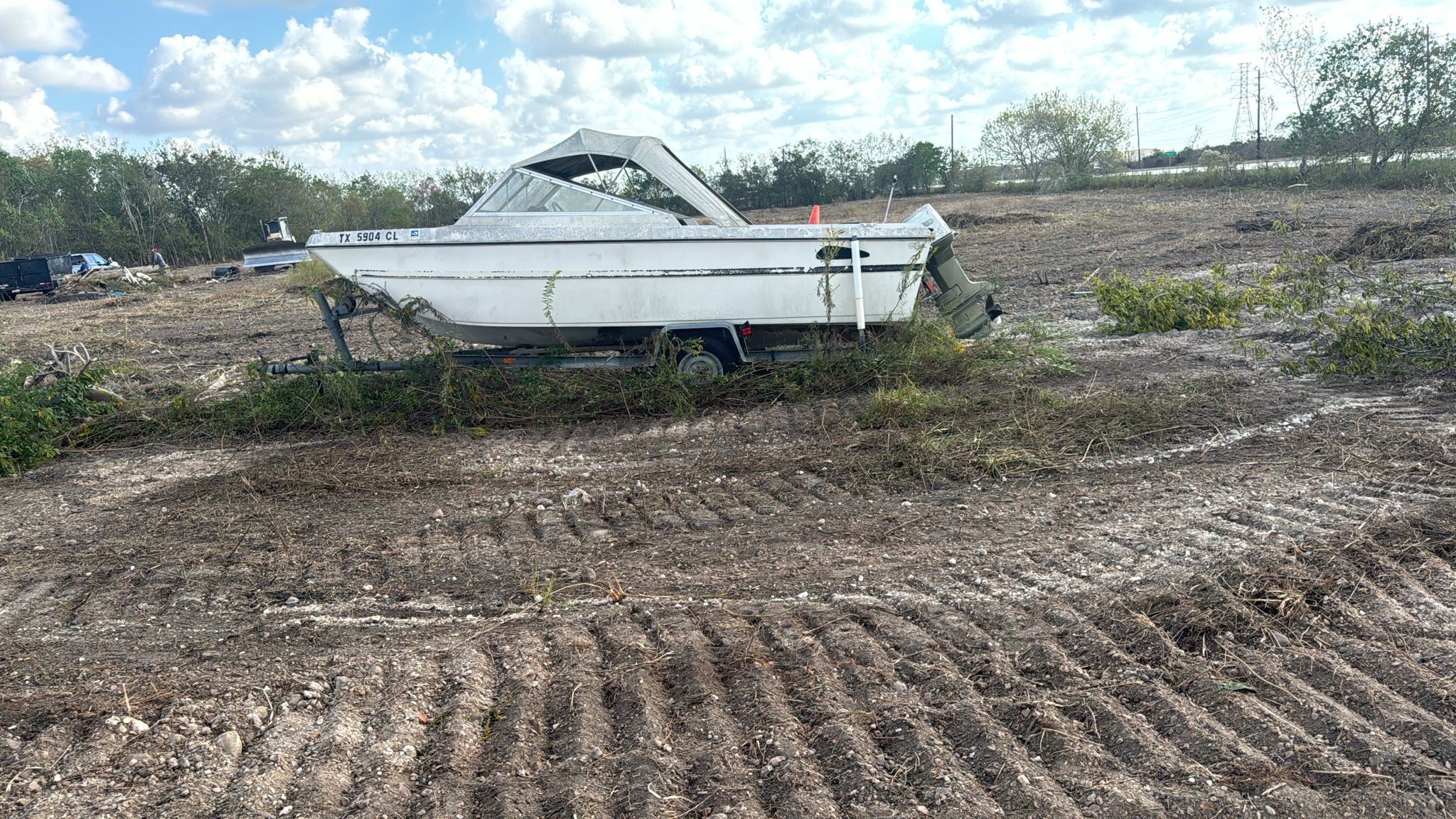 a view of a house with a yard and hanging chair