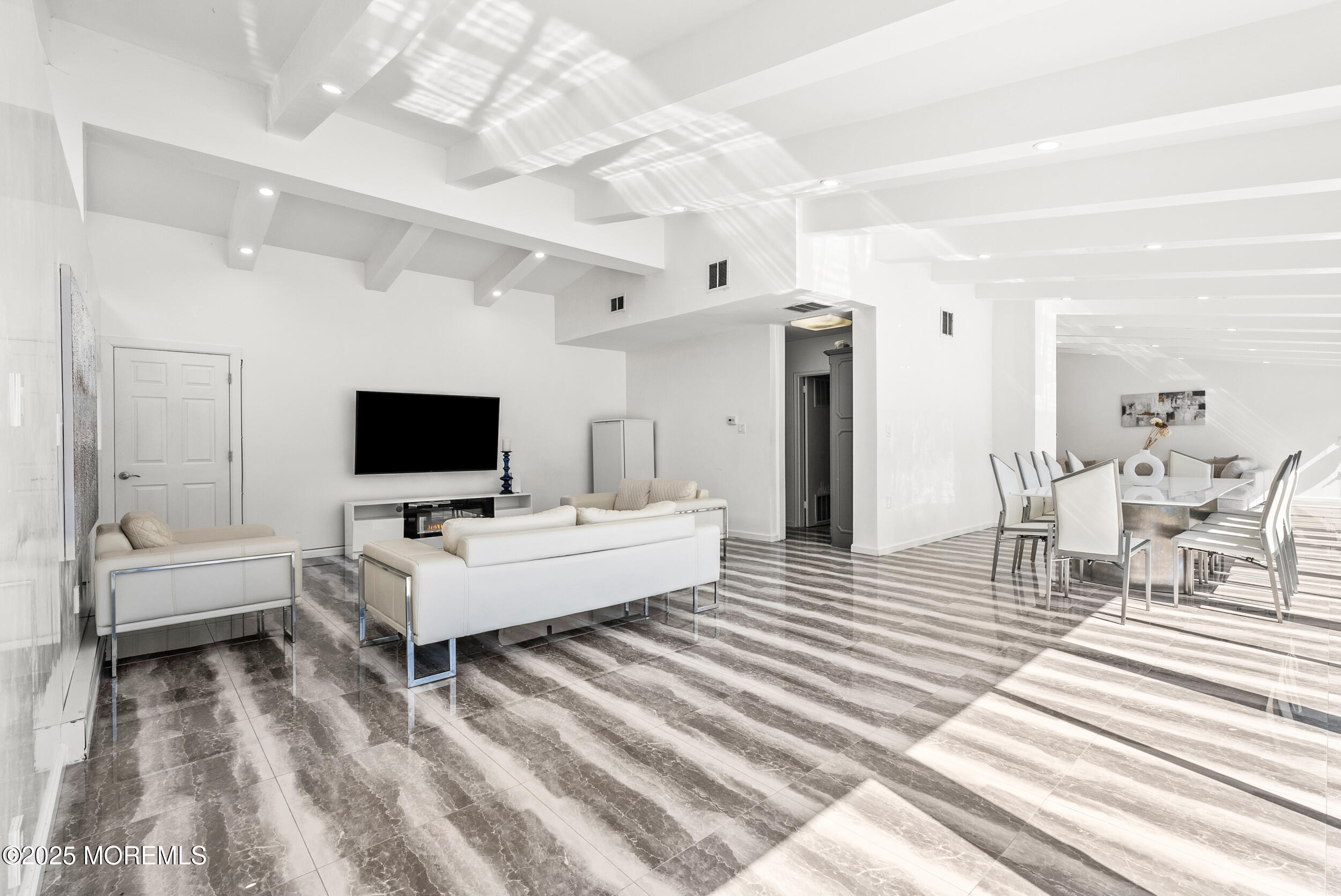 512 Deal Road Asbury Park, NJ 07712 - Photo 15 of 40 a living room with furniture and a flat screen tv