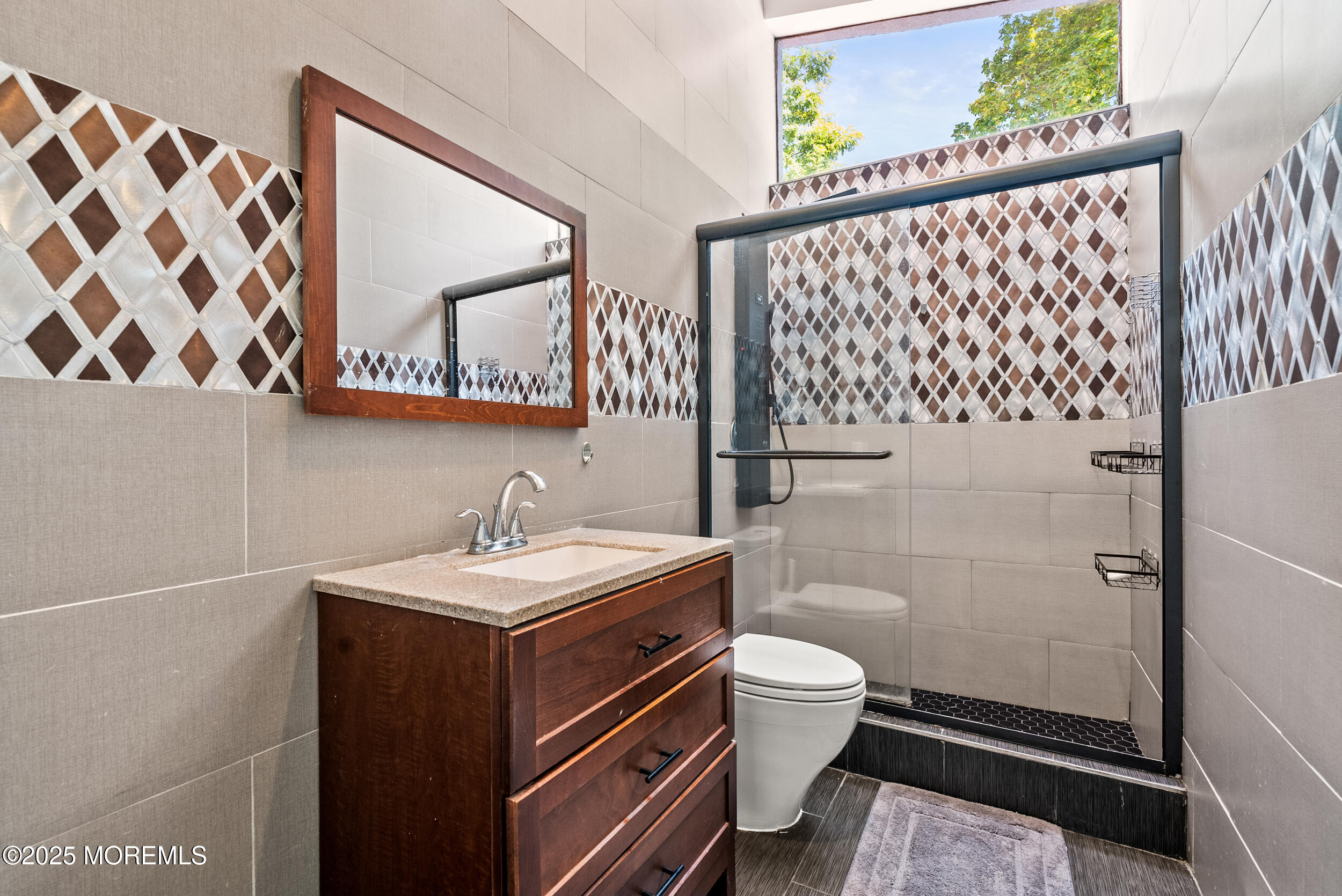 512 Deal Road Asbury Park, NJ 07712 - Photo 27 of 40 a bathroom with a sink toilet and shower