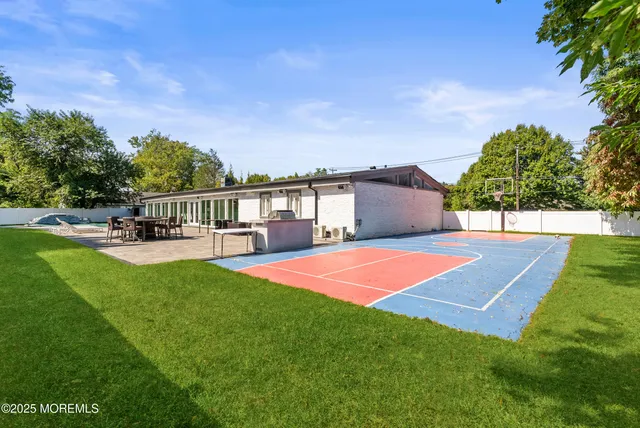 a view of a backyard of the house