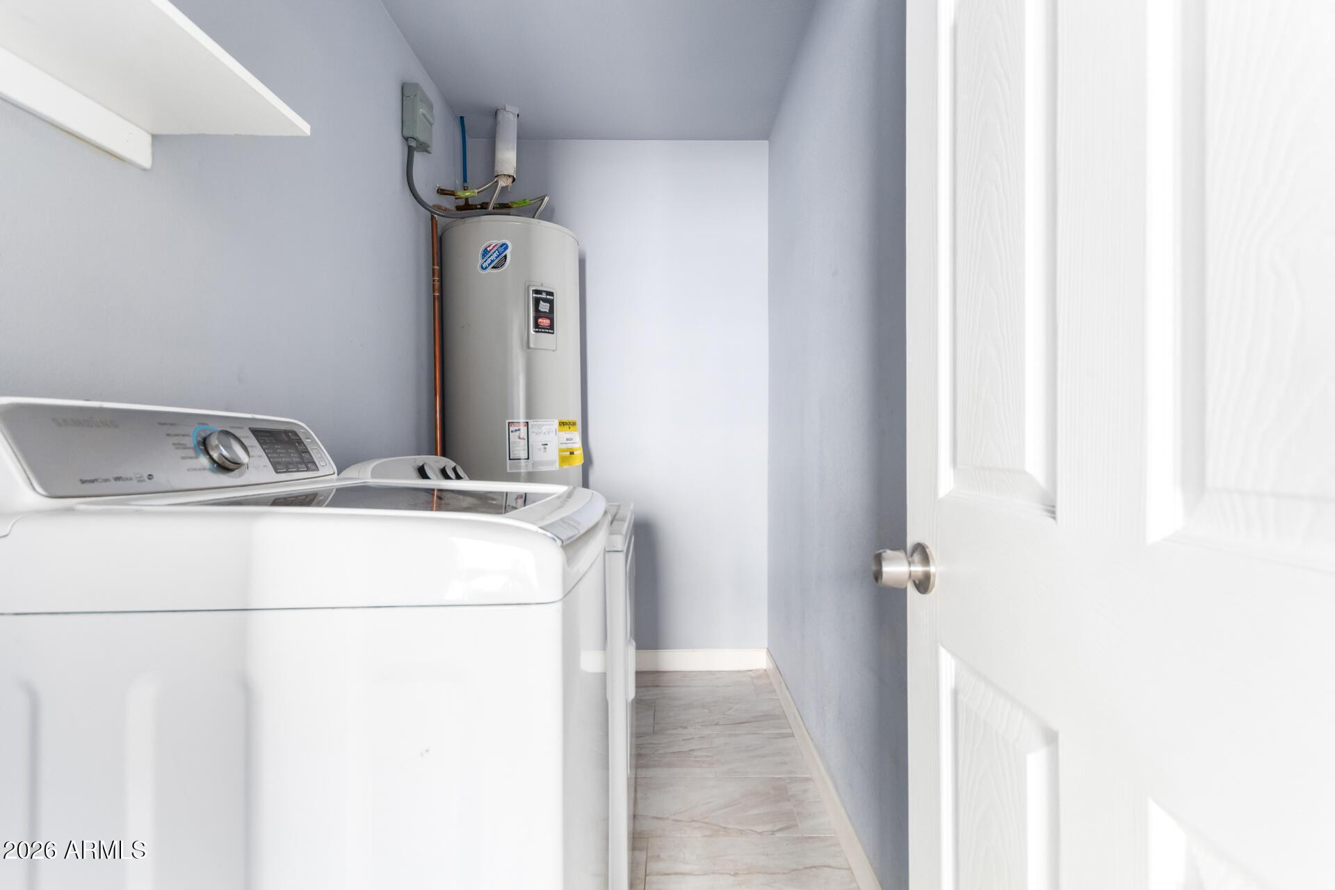 1636 East Whitton Avenue Phoenix, AZ 85016 - Photo 12 of 15 a utility room with dryer and washer