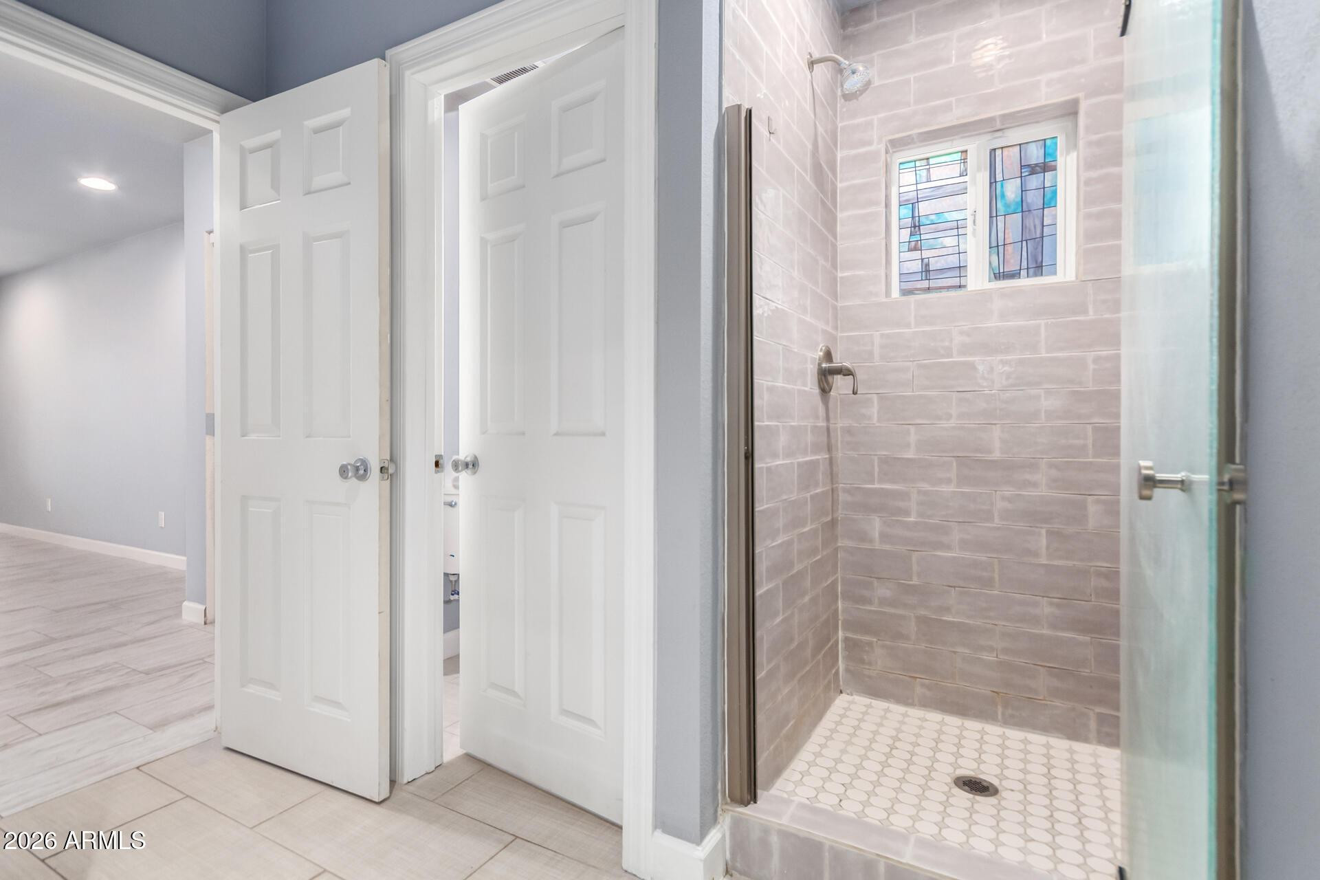 1636 East Whitton Avenue Phoenix, AZ 85016 - Photo 7 of 15 a bathroom with a shower