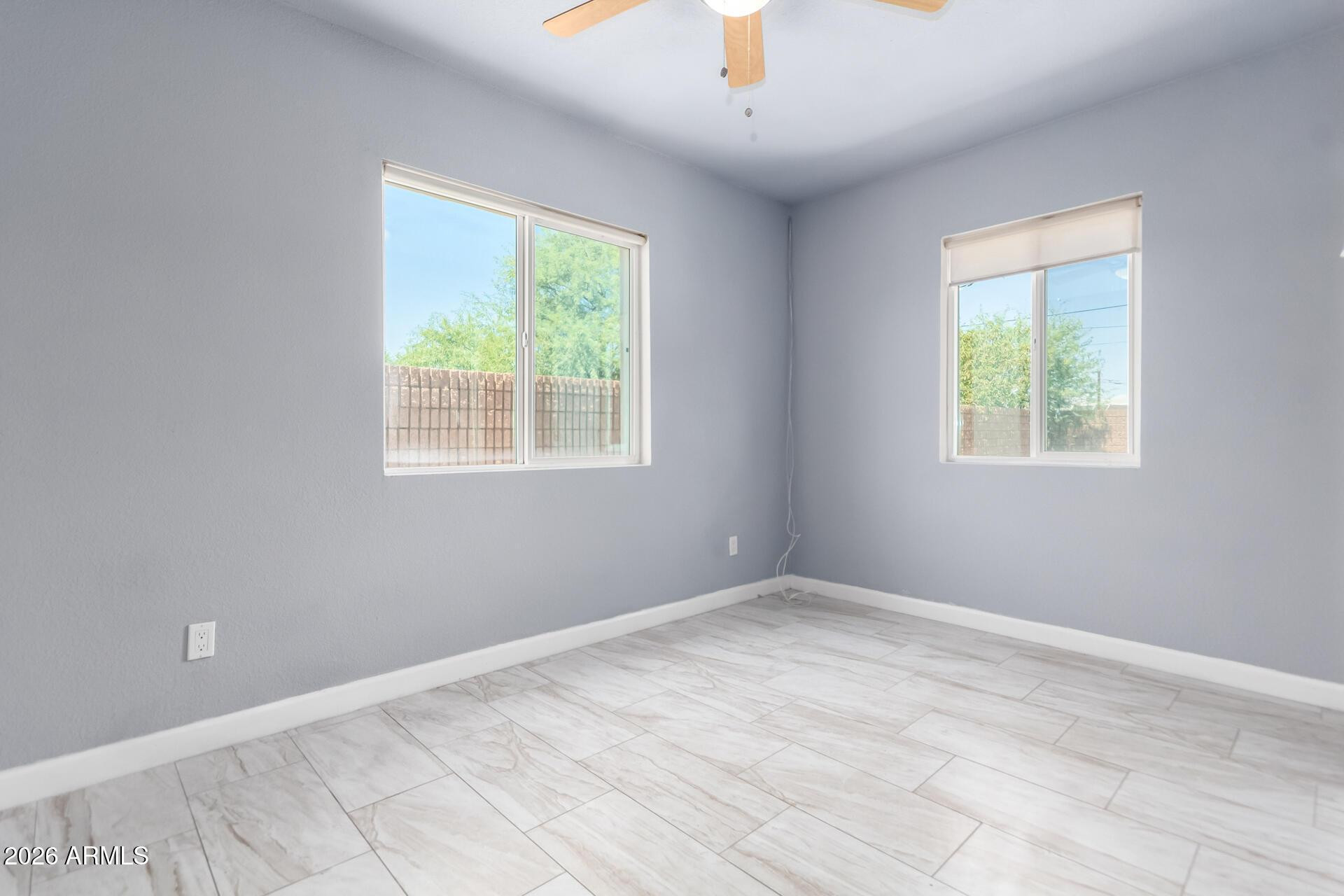 1636 East Whitton Avenue Phoenix, AZ 85016 - Photo 9 of 15 an empty room with a window