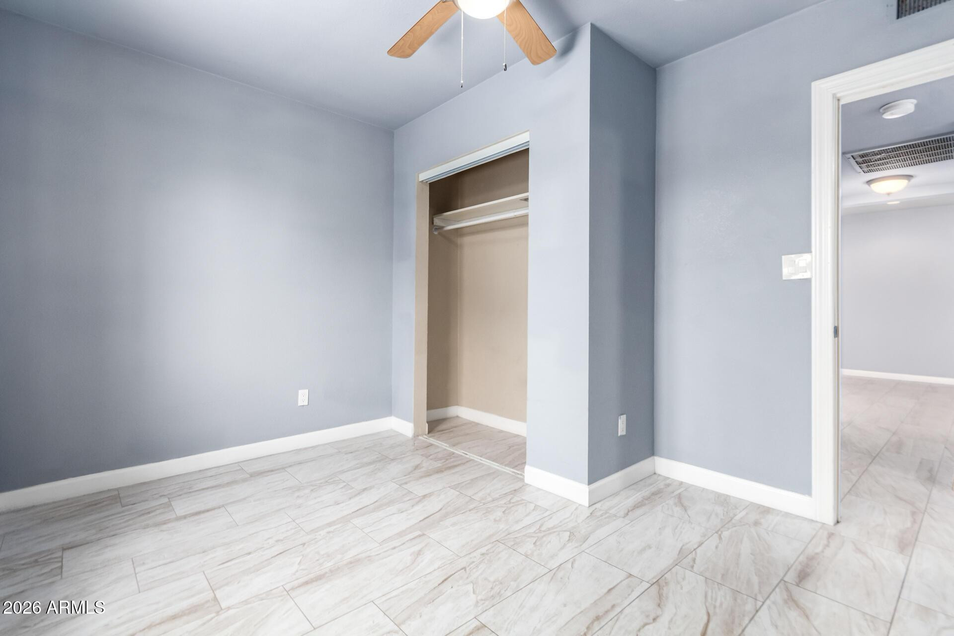 1636 East Whitton Avenue Phoenix, AZ 85016 - Photo 10 of 15 a view of an empty room and window