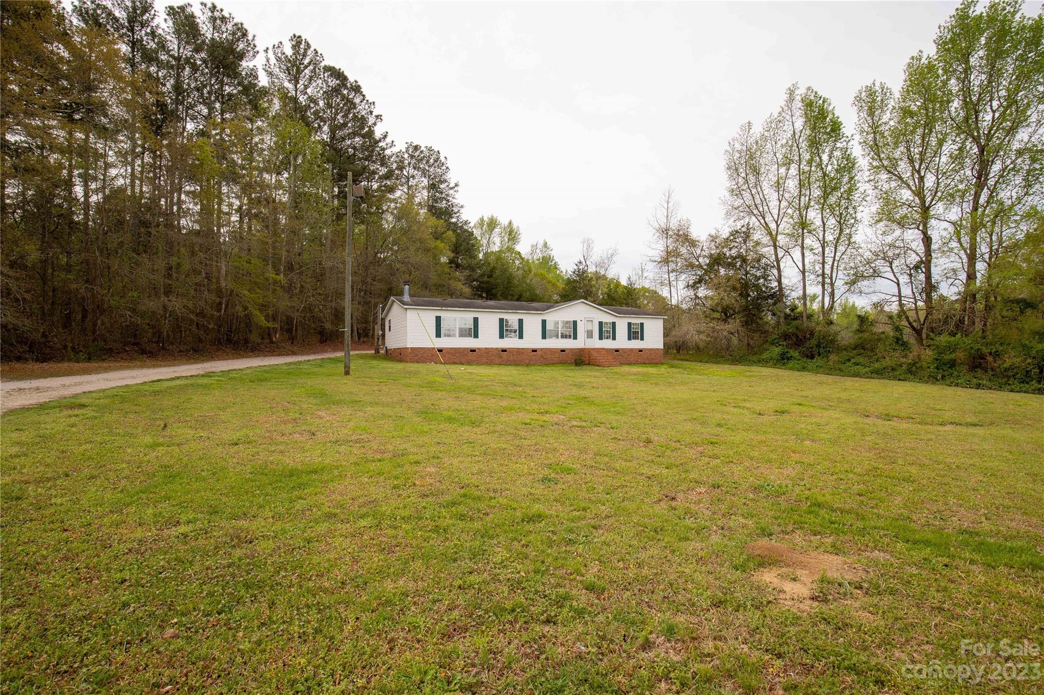 3678 Old Camden Road Heath Springs, SC 29058 - Photo 34 of 34 a view of ocean with trees