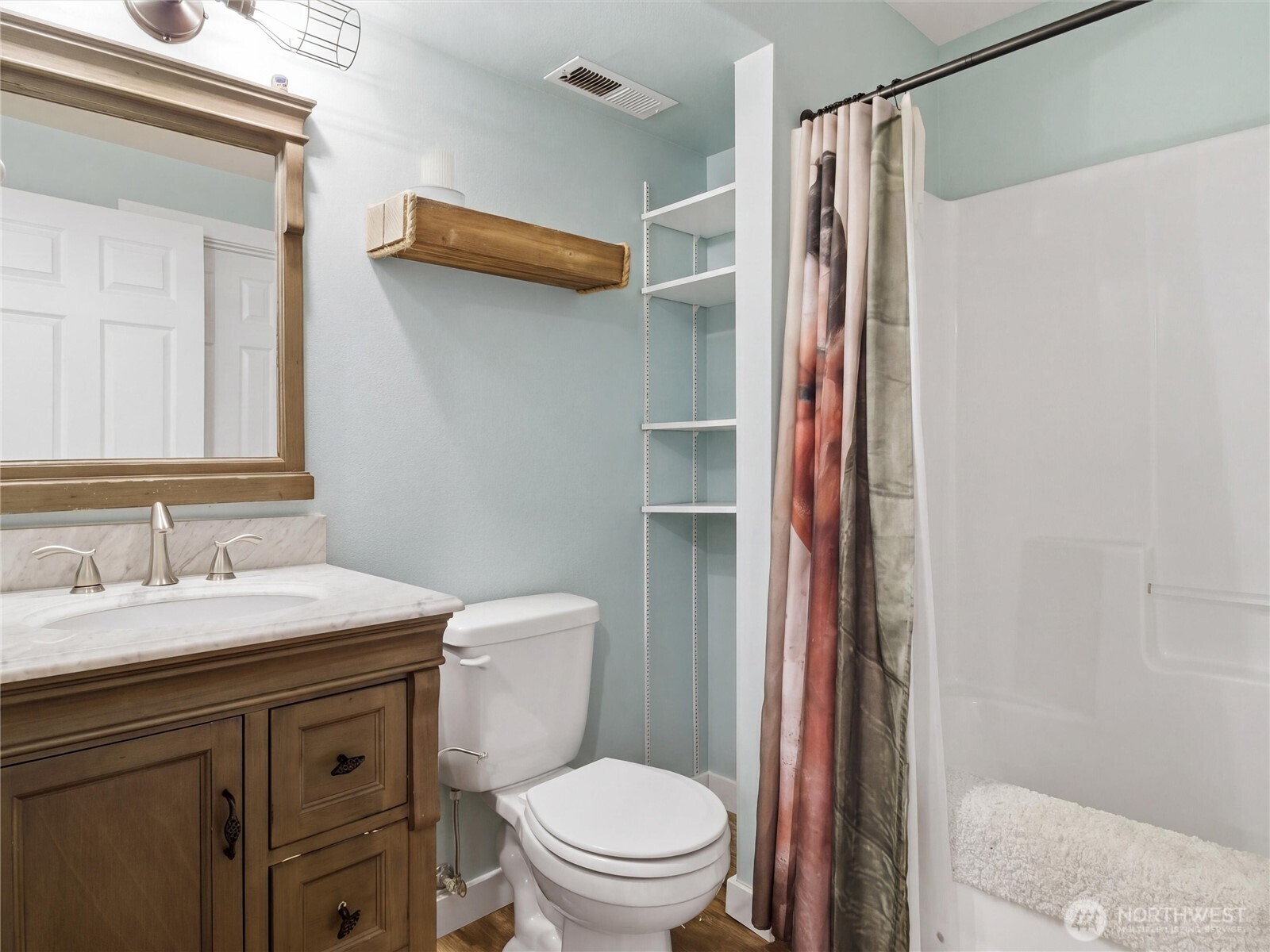 115 Romerman Road Chehalis, WA 98532 - Photo 24 of 40 a bathroom with a granite countertop sink toilet and shower
