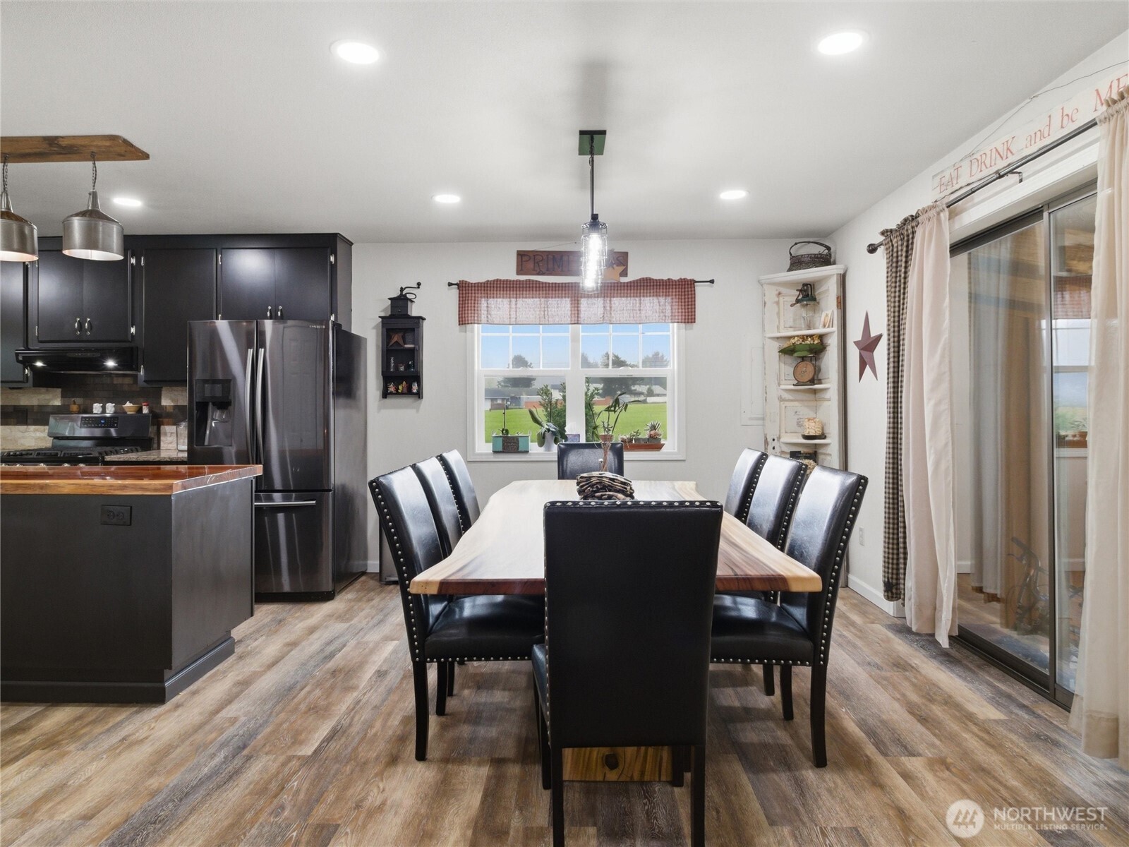 115 Romerman Road Chehalis, WA 98532 - Photo 8 of 40 a view of a dining room with furniture window and wooden floor