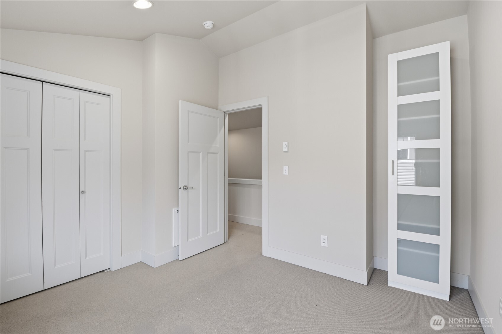 723 North 95th Street, Unit A Seattle, WA 98103 - Photo 18 of 20 an empty room with closet
