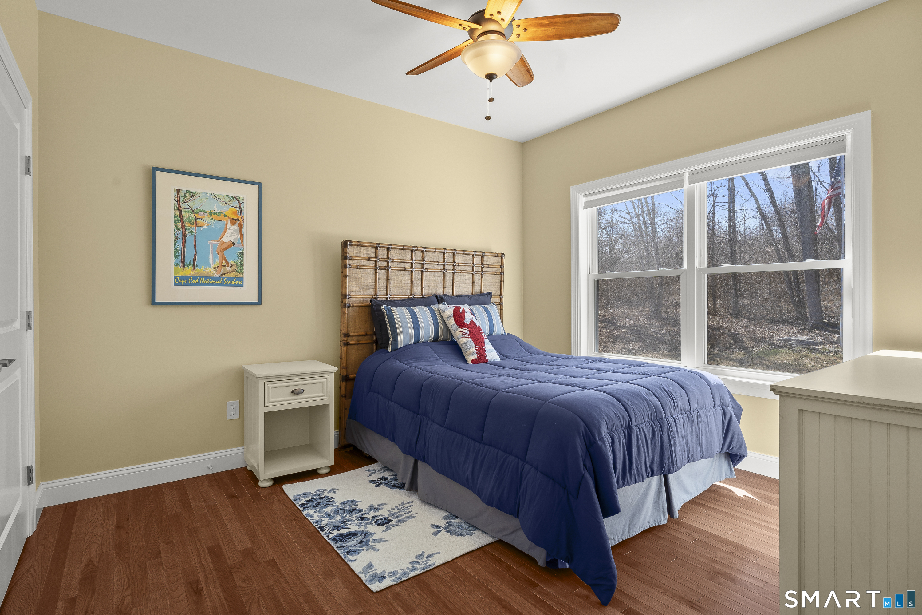 6 Syleo Lane Salem, CT 06420 - Photo 25 of 38 a bedroom with a large bed and a window