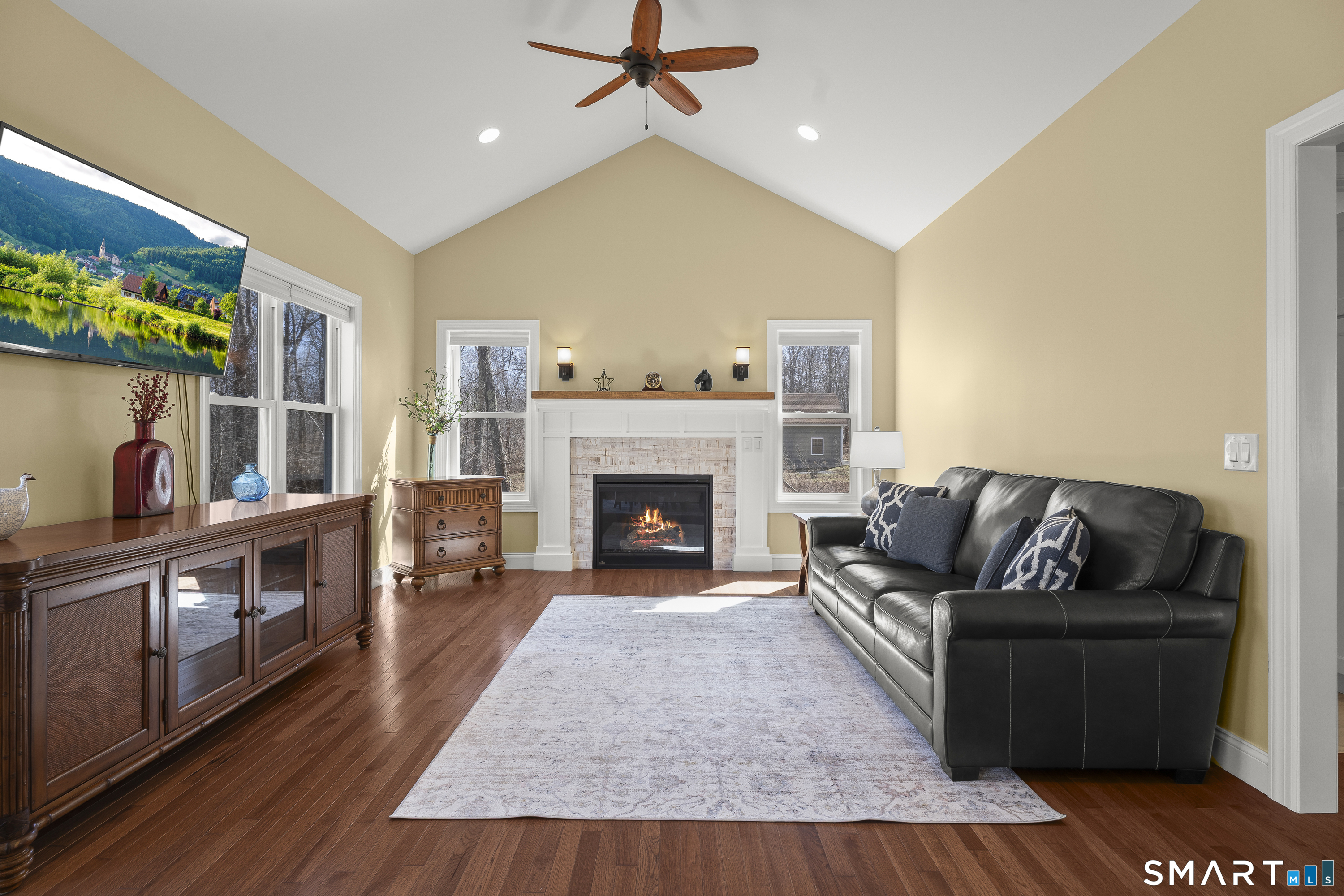 6 Syleo Lane Salem, CT 06420 - Photo 3 of 38 a living room with furniture and a fireplace