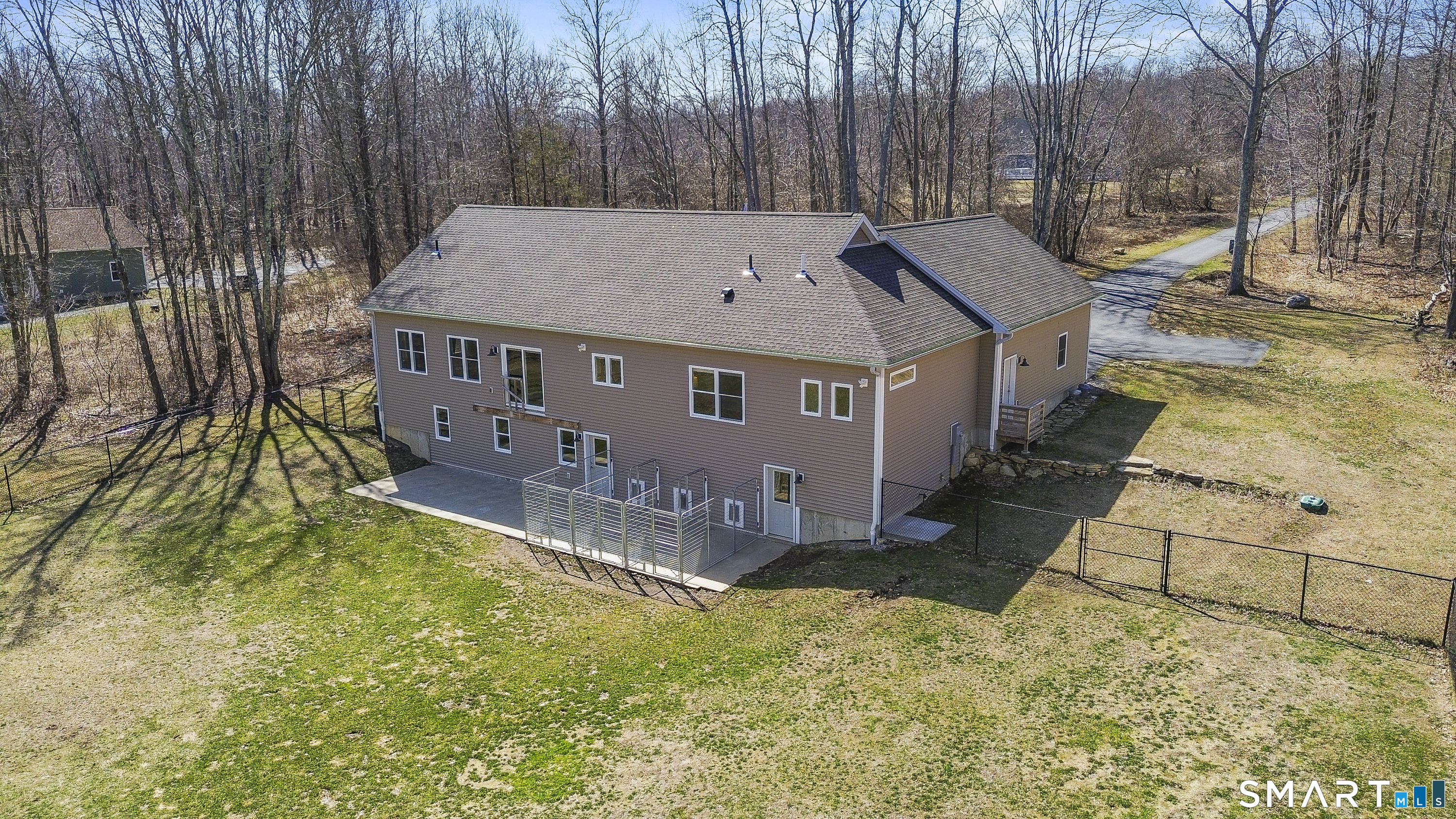 6 Syleo Lane Salem, CT 06420 - Photo 35 of 38 an aerial view of a house with yard and sitting area