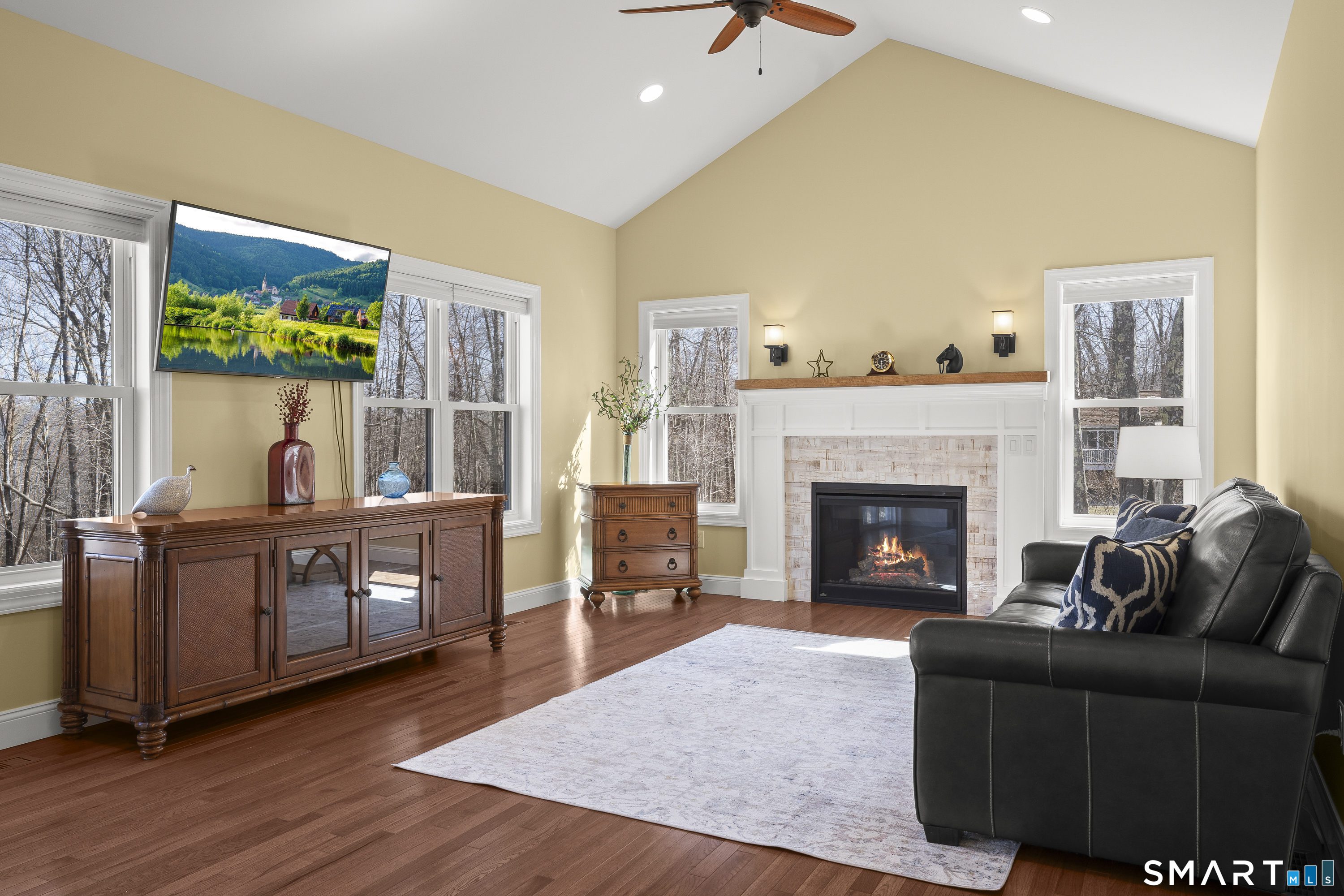6 Syleo Lane Salem, CT 06420 - Photo 4 of 38 a living room with furniture and a fireplace