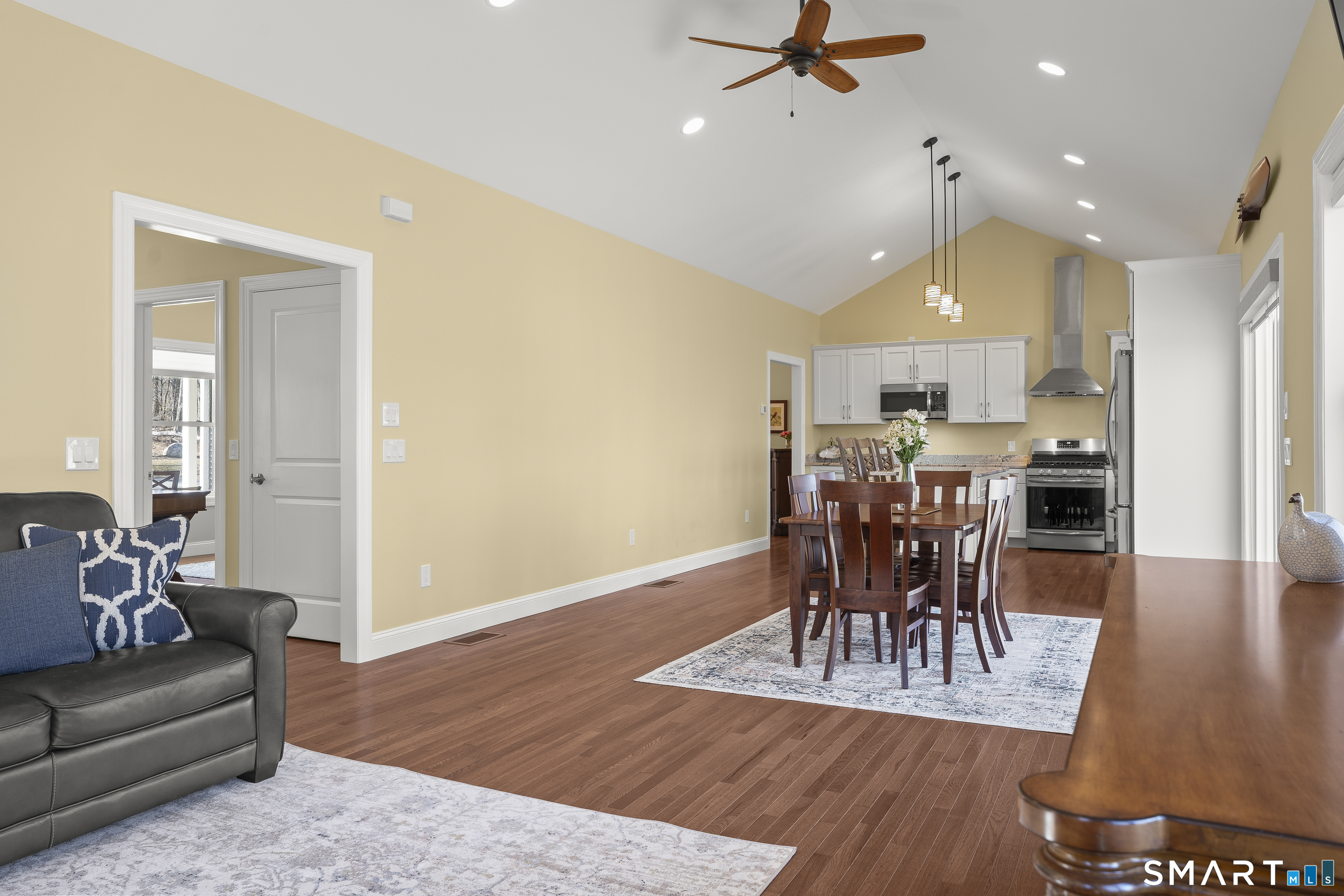 6 Syleo Lane Salem, CT 06420 - Photo 6 of 38 a view of a dining room with furniture and wooden floor