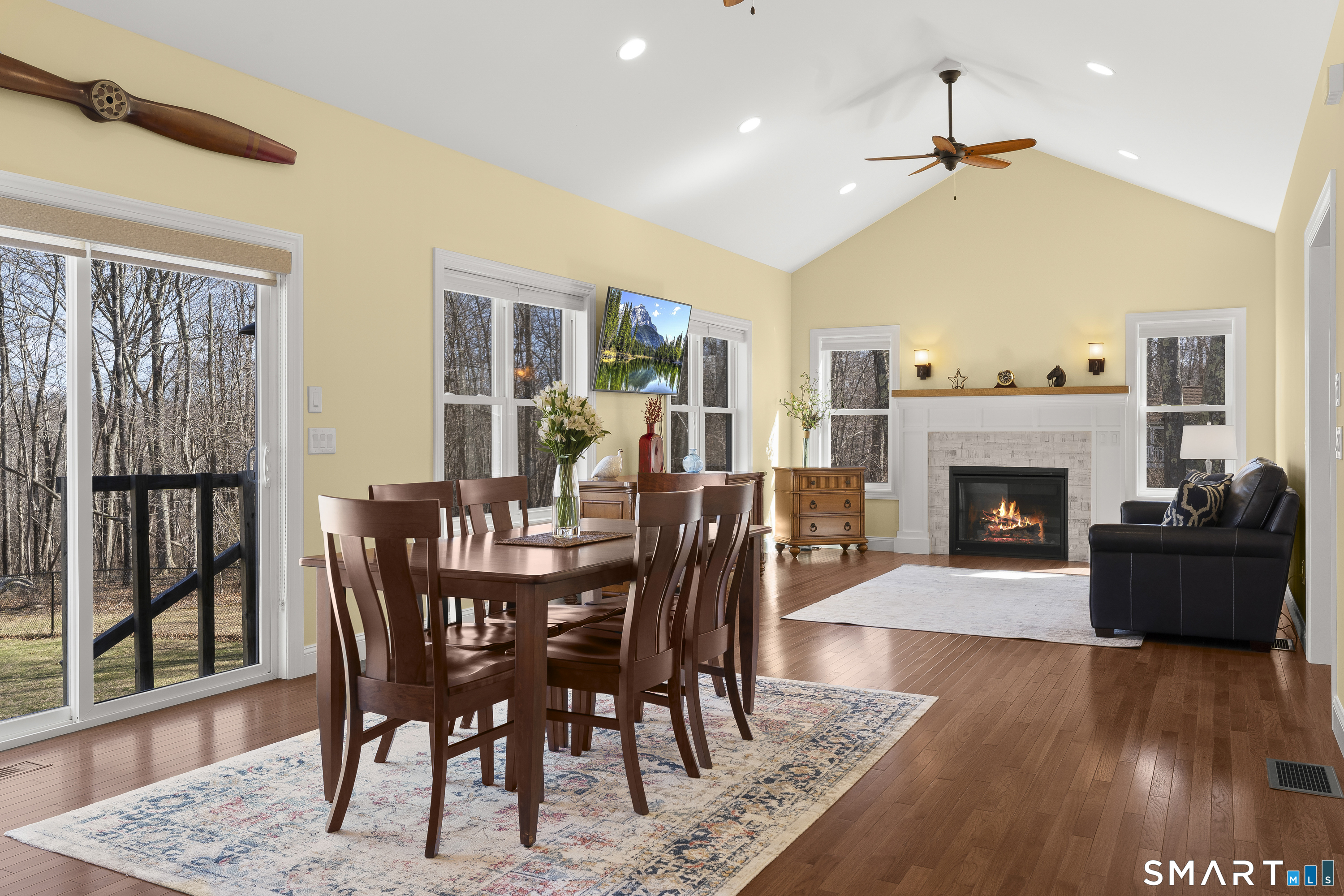 6 Syleo Lane Salem, CT 06420 - Photo 8 of 38 a view of a dining room with furniture window and wooden floor