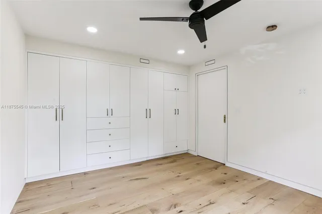 a view of a swimming pool with a yard