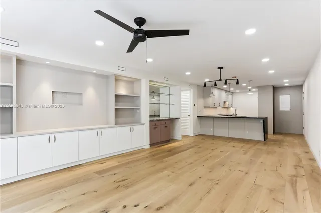 a view of kitchen with wooden floor