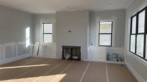 a view of a livingroom with a fireplace