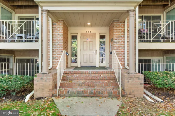 a front view of a house with a porch