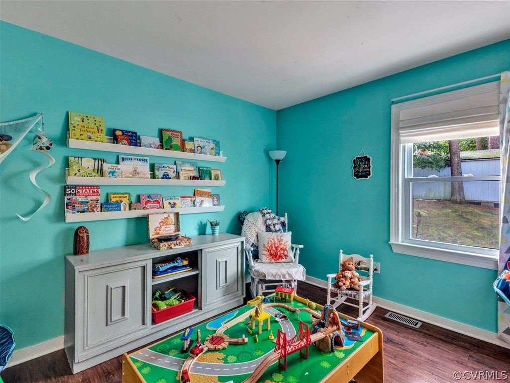 2606 Colgrave Road Midlothian, VA 23112 - Photo 11 of 22 a room with toys and a wooden floor